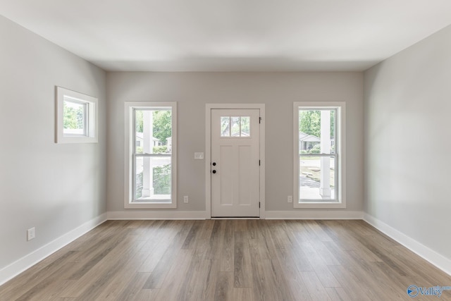 1201 Halsey Ave, Huntsville, AL 35801 - entryway with light wood-type flooring and baseboards