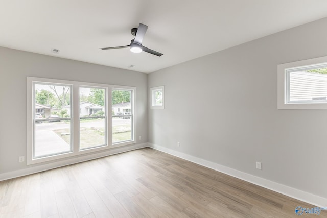 1201 Halsey Ave, Huntsville, AL 35801 - unfurnished room featuring light wood-style flooring, baseboards, and ceiling fan