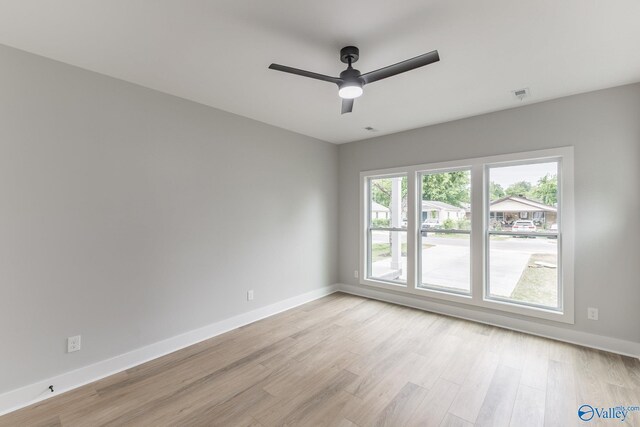 1201 Halsey Ave, Huntsville, AL 35801 - unfurnished room featuring light wood-type flooring, baseboards, and ceiling fan