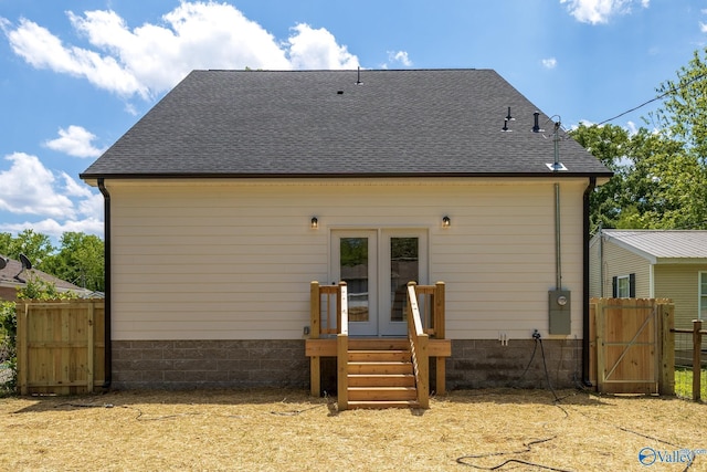 1201 Halsey Ave, Huntsville, AL 35801 - back of property featuring french doors, fence, roof with shingles, and a gate