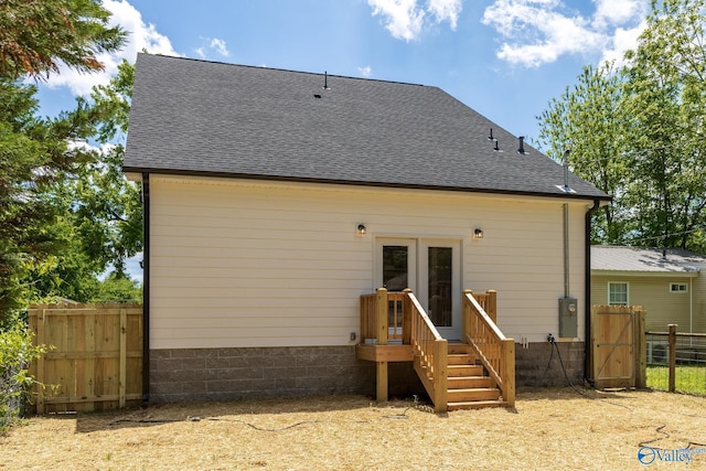 1201 Halsey Ave, Huntsville, AL 35801 - back of property with french doors, fence, and roof with shingles