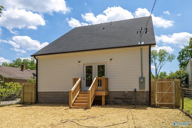 1201 Halsey Ave, Huntsville, AL 35801 - back of property with fence, a gate, roof with shingles, and french doors