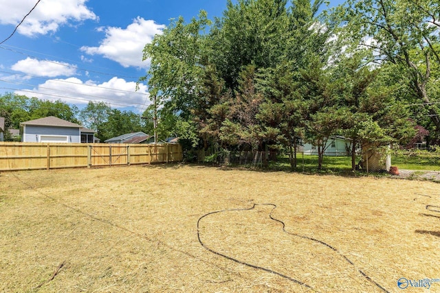 1201 Halsey Ave, Huntsville, AL 35801 - fenced backyard with a garage