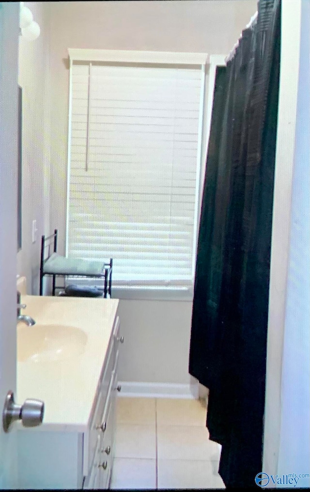 bathroom featuring vanity and tile patterned floors