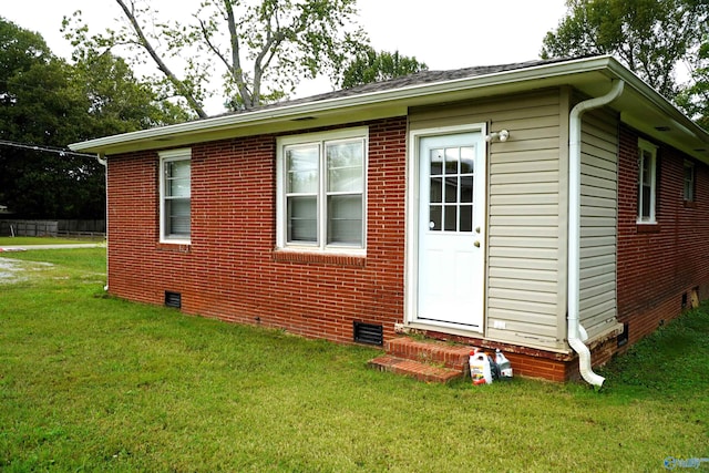 view of home's exterior featuring a lawn