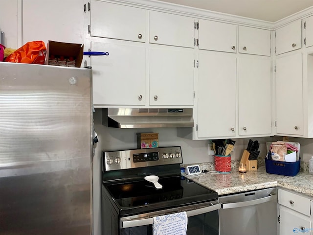 kitchen with white cabinetry, range hood, and stainless steel appliances