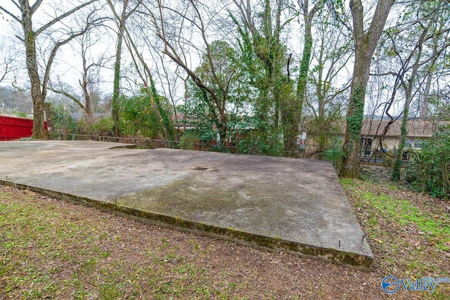 view of yard featuring basketball court