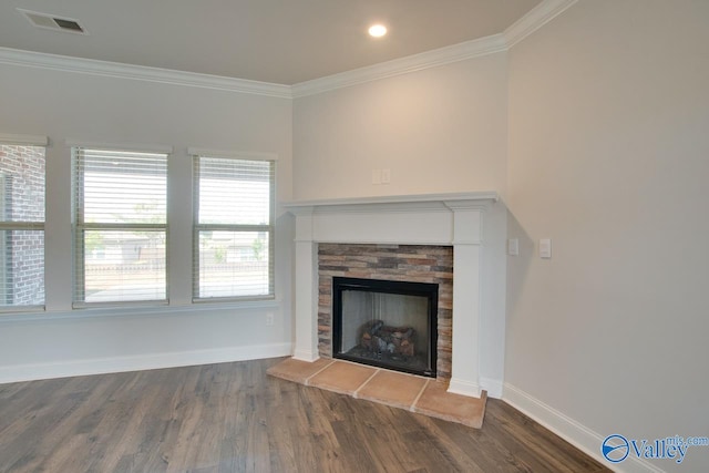 unfurnished living room featuring a fireplace, ornamental molding, and hardwood / wood-style flooring