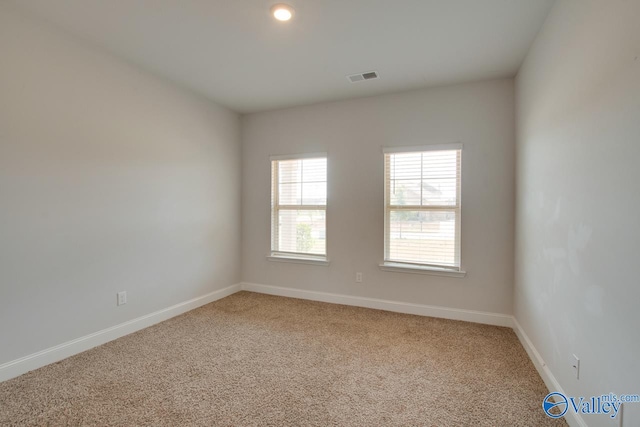 view of carpeted spare room