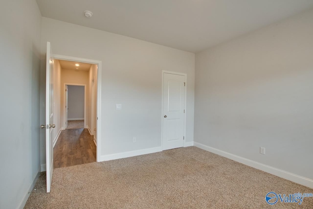 unfurnished bedroom with carpet