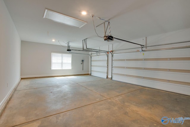 garage featuring a garage door opener