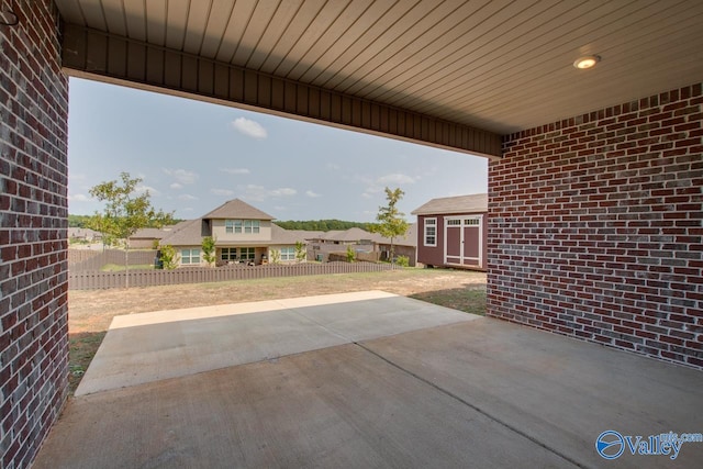 view of patio featuring an outdoor structure