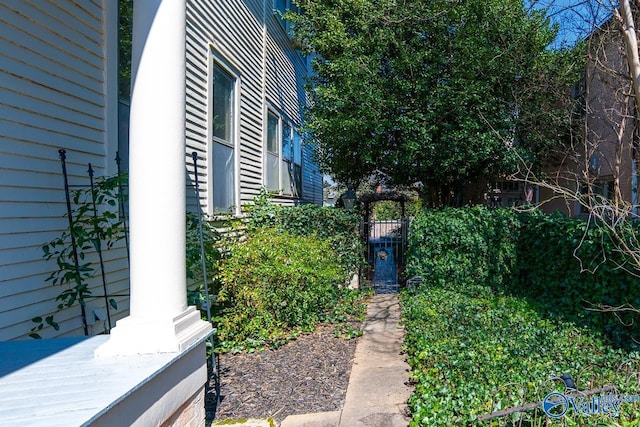 view of side of property with fence