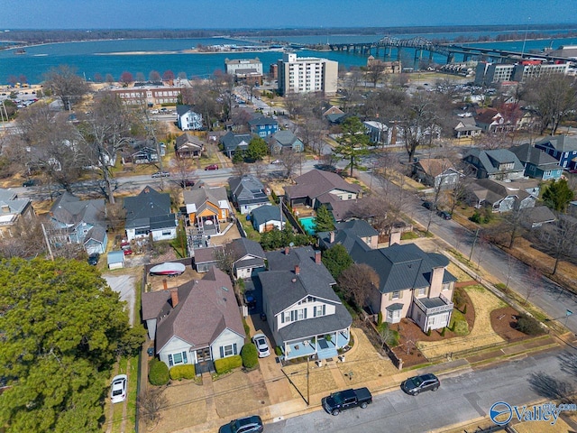 aerial view featuring a residential view and a water view