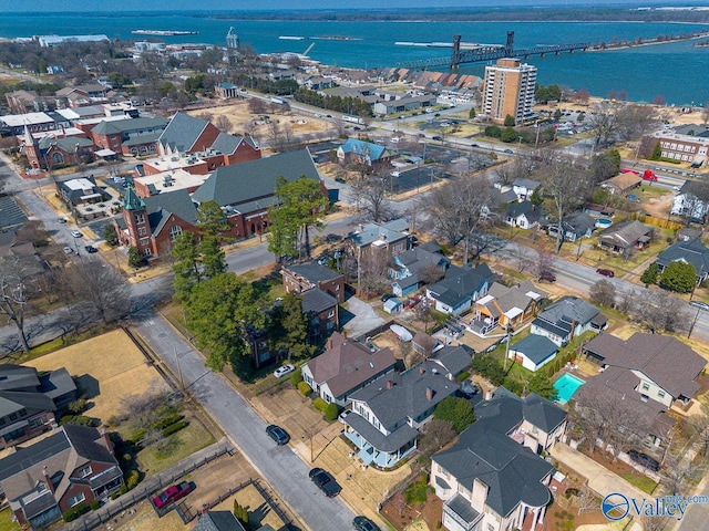 bird's eye view featuring a residential view and a water view