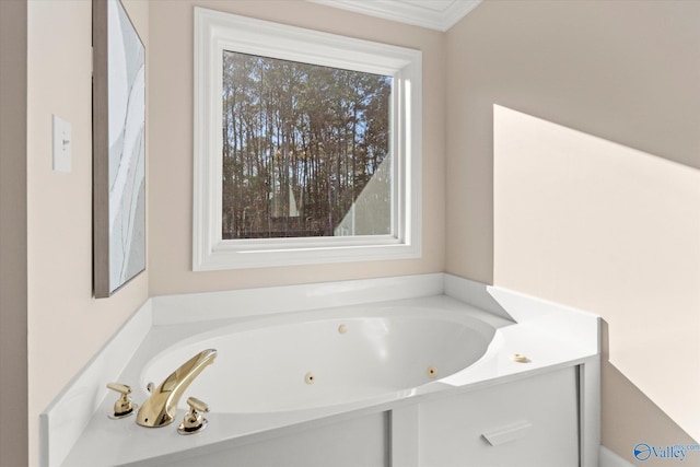 full bathroom with ornamental molding and a jetted tub