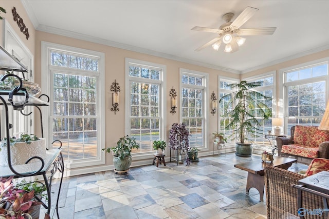 sunroom featuring ceiling fan