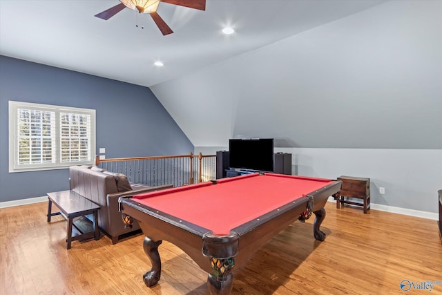 game room with pool table, a ceiling fan, baseboards, vaulted ceiling, and light wood-type flooring