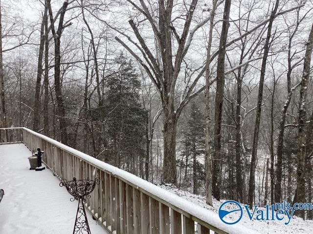 view of snow covered deck