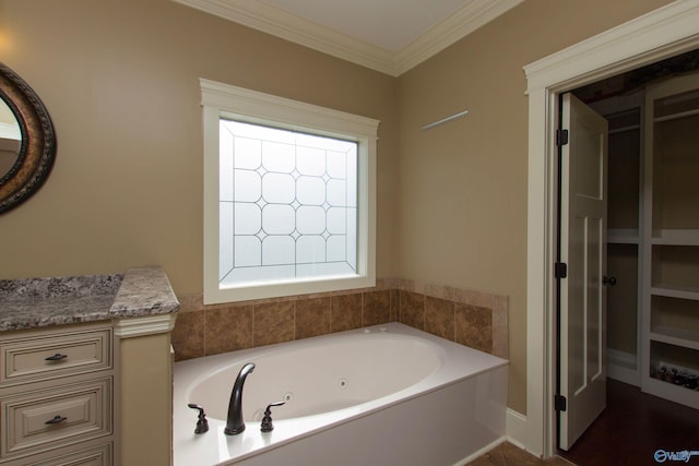 bathroom with a bathtub and crown molding