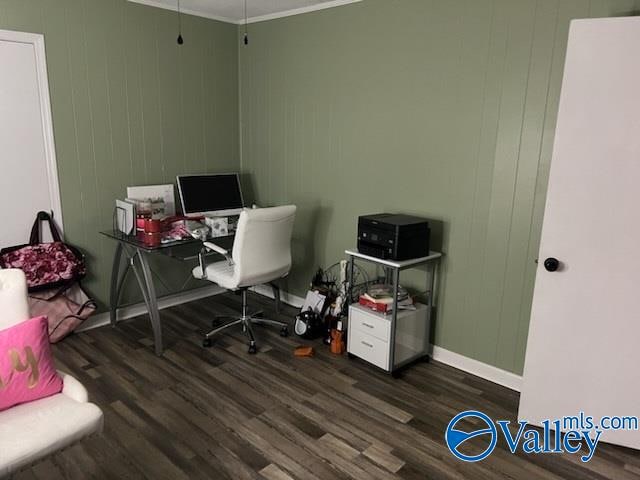 office featuring dark hardwood / wood-style flooring and crown molding