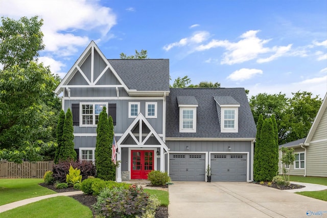 2654 Mountain Stream Way, Owens Cross Roads, AL 35763 - view of front facade with roof with shingles, board and batten siding, driveway, french doors, and a garage