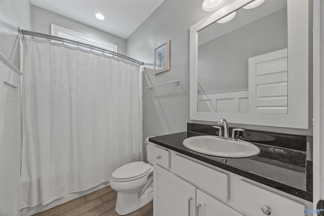 2654 Mountain Stream Way, Owens Cross Roads, AL 35763 - bathroom featuring vanity, wood finished floors, and shower / bath combo with shower curtain