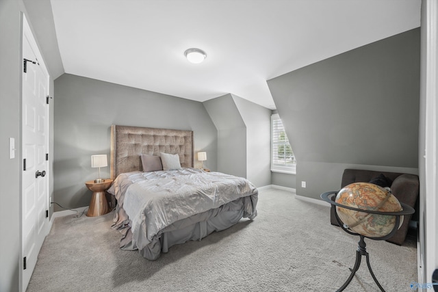 2654 Mountain Stream Way, Owens Cross Roads, AL 35763 - carpeted bedroom with vaulted ceiling and baseboards
