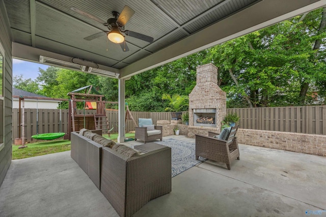 2654 Mountain Stream Way, Owens Cross Roads, AL 35763 - fenced backyard with a patio, a playground, an outdoor living space with a fireplace, and ceiling fan