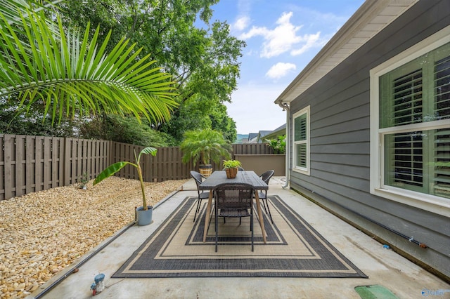 2654 Mountain Stream Way, Owens Cross Roads, AL 35763 - fenced backyard with a patio and outdoor dining space