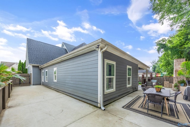 2654 Mountain Stream Way, Owens Cross Roads, AL 35763 - rear view of house with a patio and outdoor dining space