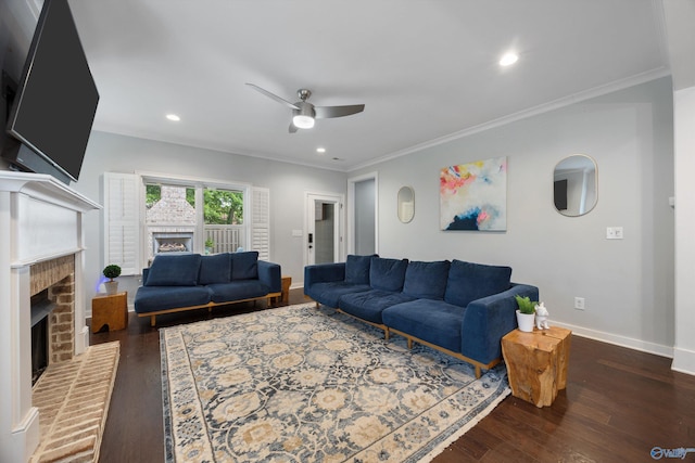 2654 Mountain Stream Way, Owens Cross Roads, AL 35763 - living room featuring a fireplace, a ceiling fan, dark wood finished floors, recessed lighting, and crown molding