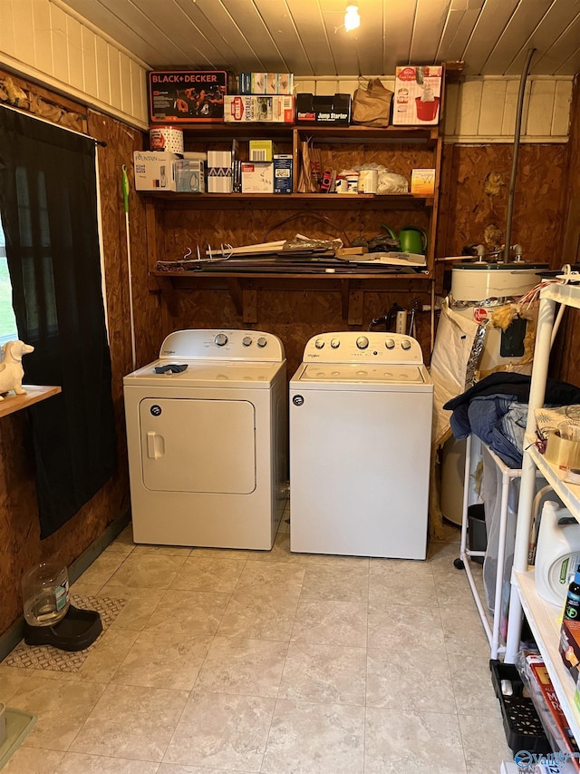 601 SW 9th Ave, Attalla, AL 35954 - clothes washing area with washing machine and clothes dryer, laundry area, wooden walls, and wooden ceiling