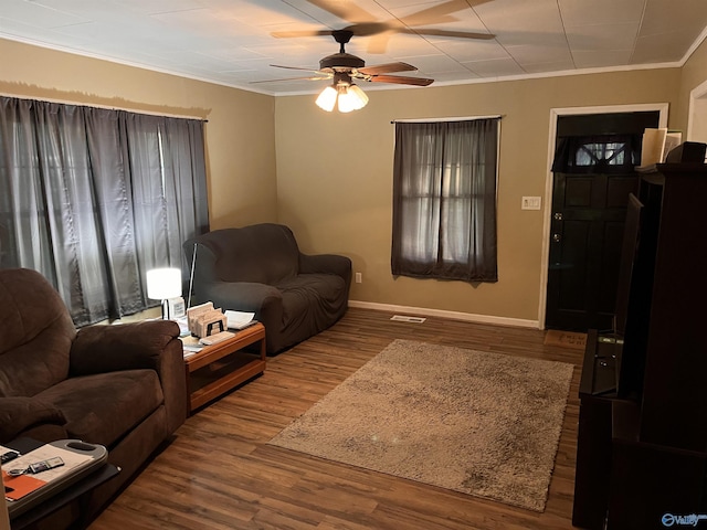 601 SW 9th Ave, Attalla, AL 35954 - living room with baseboards, crown molding, a ceiling fan, and wood finished floors