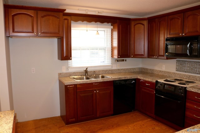 kitchen with sink and black appliances