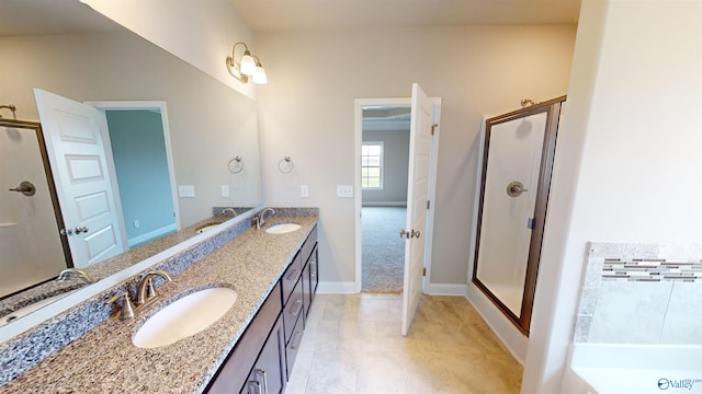 bathroom featuring vanity and separate shower and tub