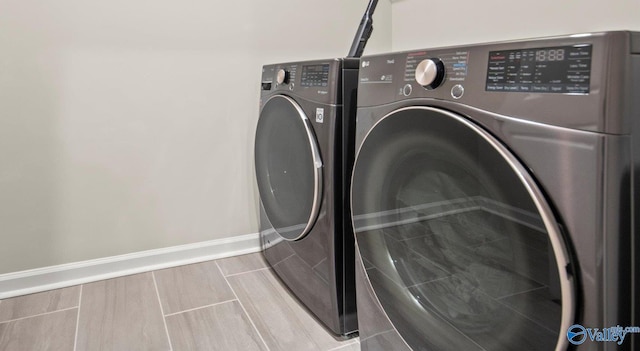 laundry room featuring separate washer and dryer and a mail area