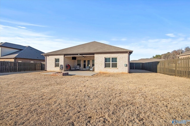 back of property with a patio area