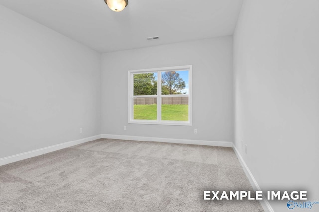 154 Heritage Lakes Blvd, New Market, AL 35761 - spare room with baseboards, visible vents, and carpet floors
