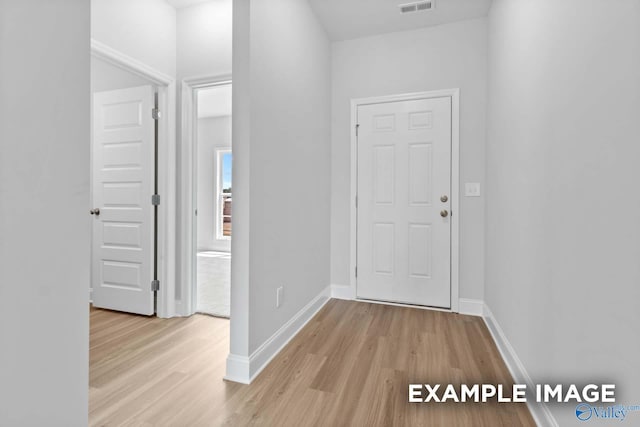 154 Heritage Lakes Blvd, New Market, AL 35761 - hallway featuring light wood-style floors, baseboards, and visible vents