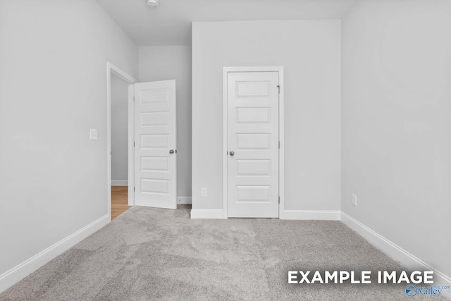 154 Heritage Lakes Blvd, New Market, AL 35761 - unfurnished bedroom with carpet flooring and baseboards