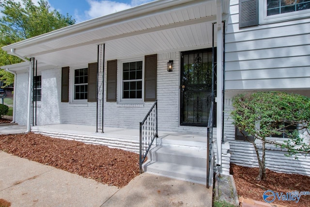 entrance to property with covered porch