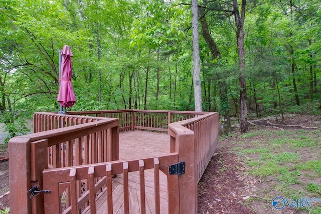 deck featuring a wooded view