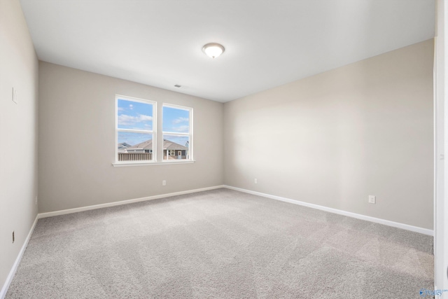 empty room featuring carpet floors