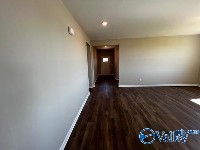 interior space featuring dark wood-type flooring