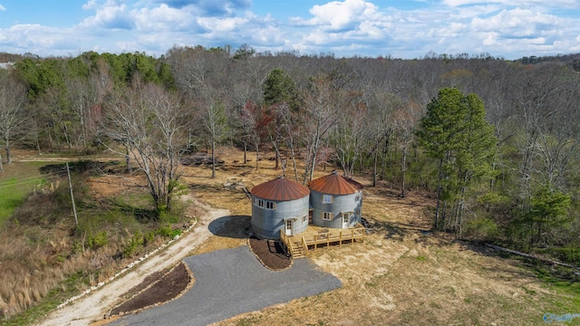 aerial view with a wooded view