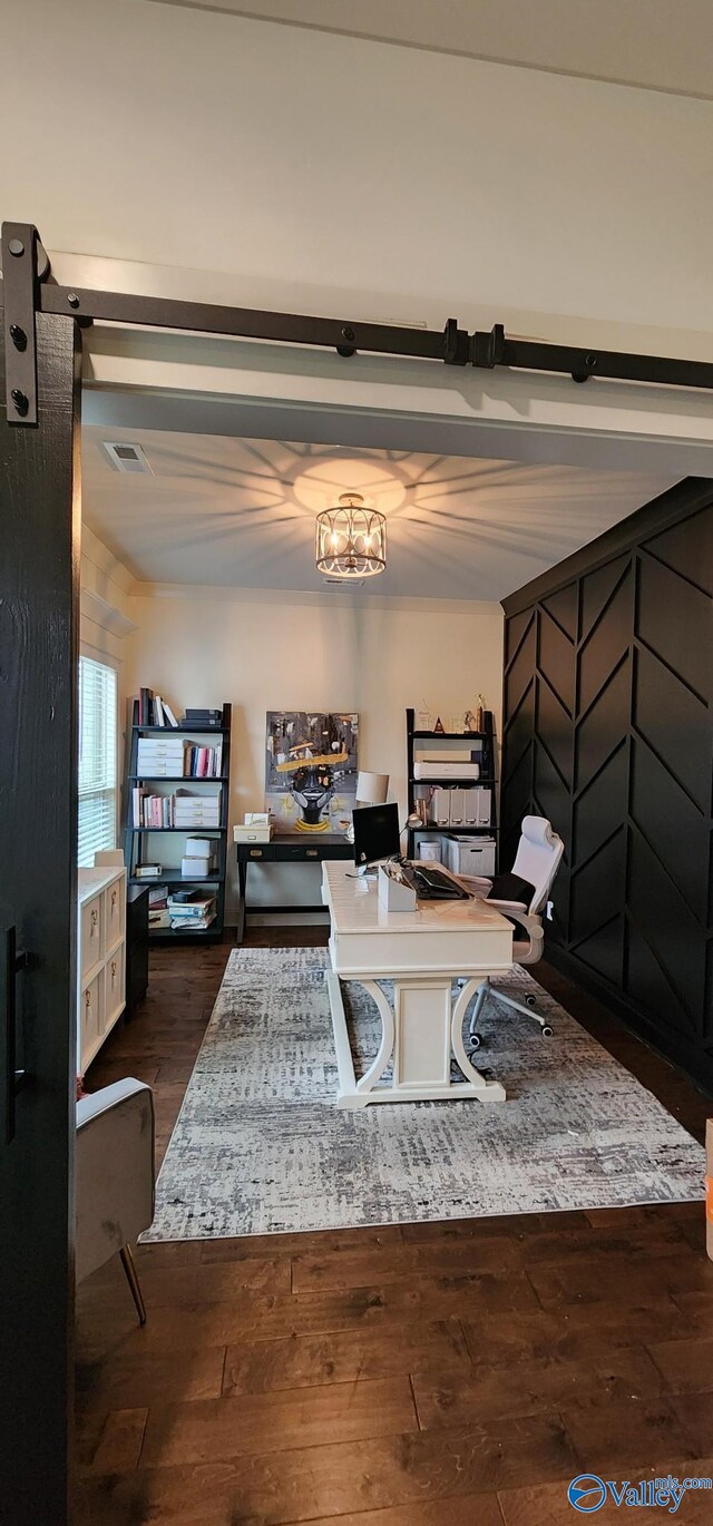 office area featuring dark wood finished floors and visible vents