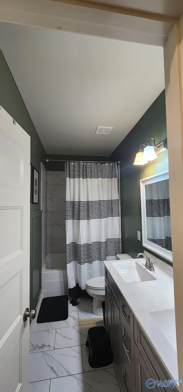 bathroom with marble finish floor, visible vents, toilet, shower / tub combo, and vanity