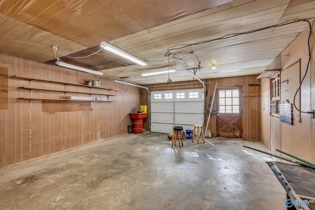 garage with wooden walls and wooden ceiling