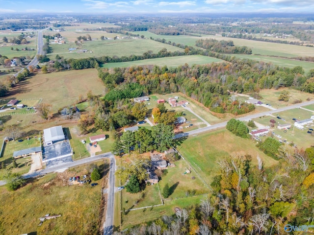 birds eye view of property featuring a rural view